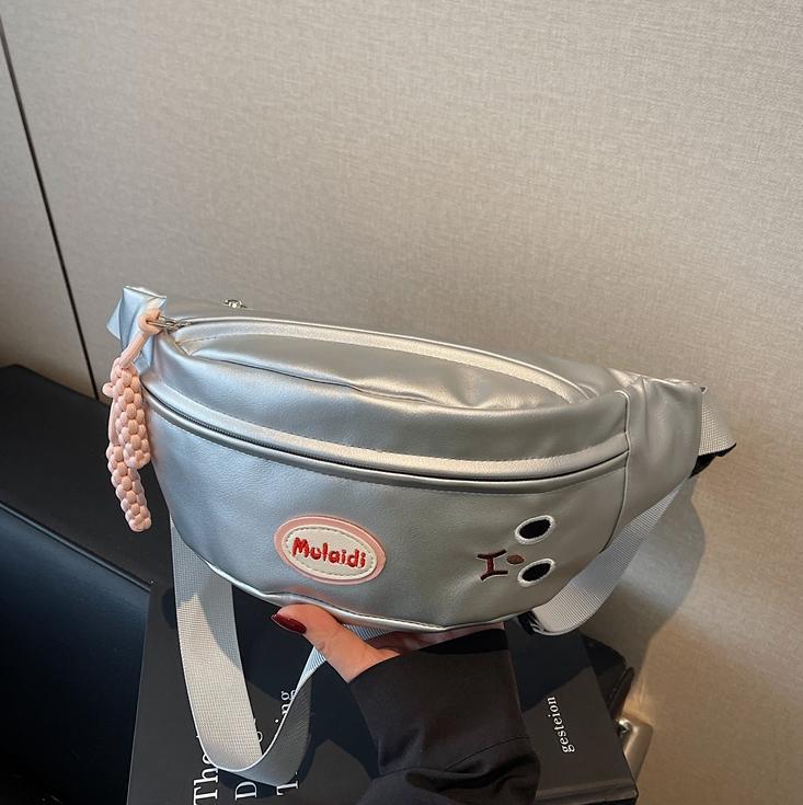 Riñonera casual simple de comercio exterior para mujer 2025 nuevo estilo coreano bolso de hombro de viajero súper caliente bolso de pecho de mensajero