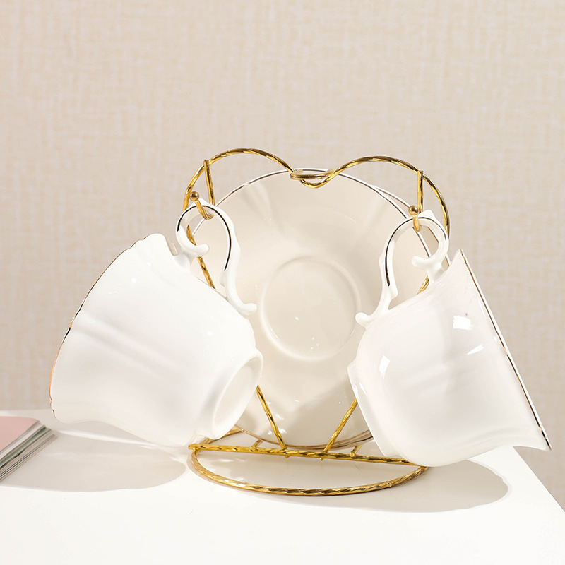 Taza de café y platillo traje estilo europeo Luz de lujo taza de café simple taza de té juego de té de cerámica taza de té negro té de la tarde estante de entrega