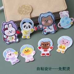 Embroidered patch with self-adhesive cartoon animal astronaut exploring space, a new design for computerized embroidery.