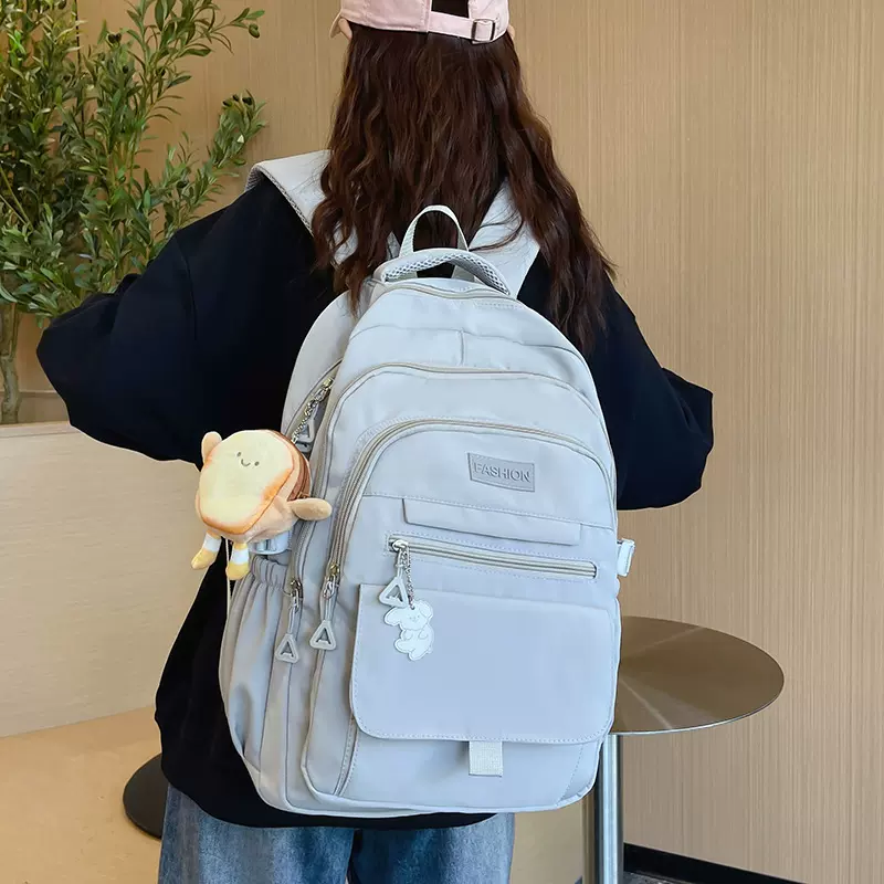 2024韩版简约双肩包大容量初高中男女学生校园书包批发休闲背包