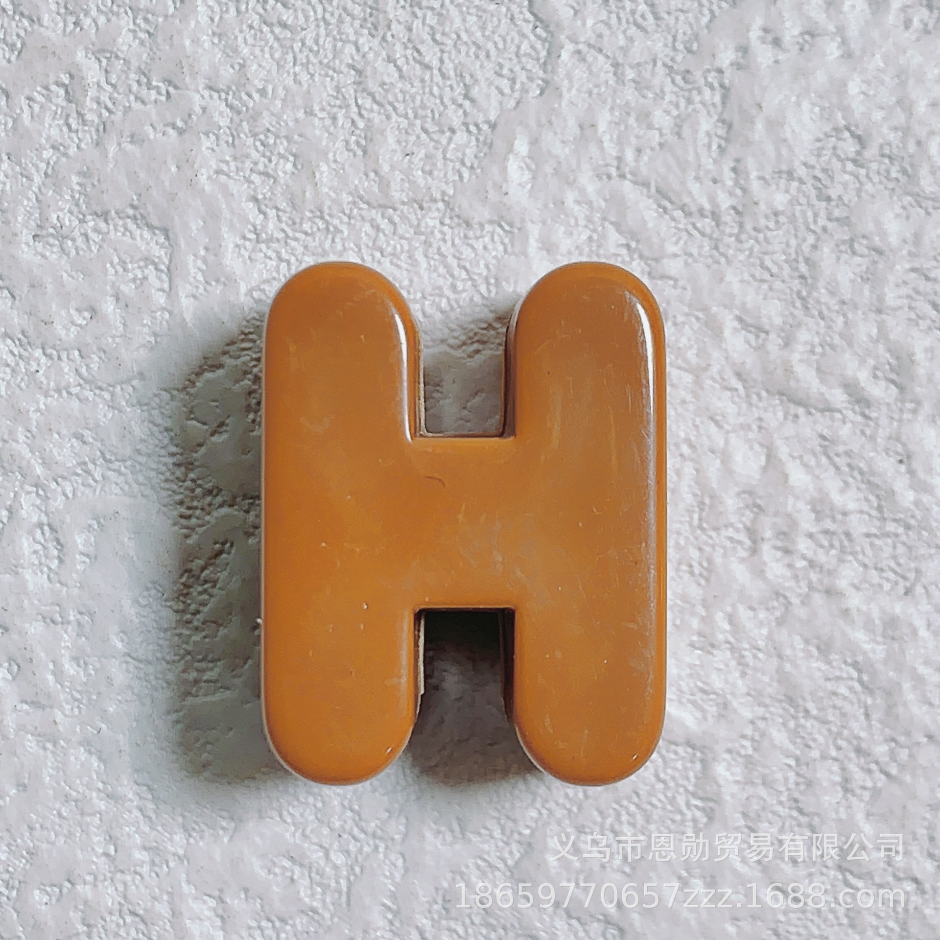 H (brown)