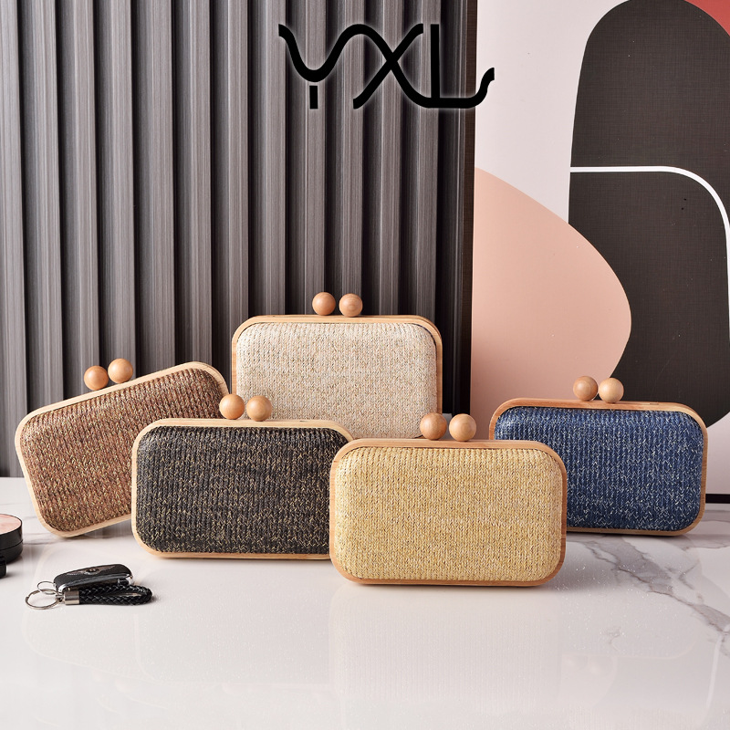 2025 más reciente venta de verano de madera sólida bolsa de cena de tela tejida bolsas de mano diarias simples ventas transfronterizas