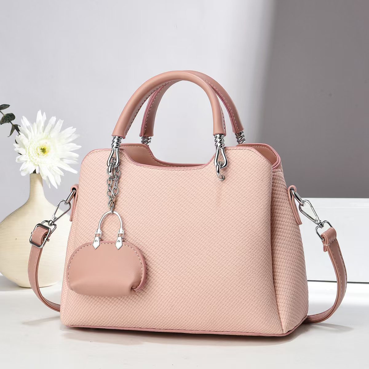 2025 bolso de mujer atmosférico de un solo hombro de moda salvaje portátil nuevo patrón tejido fabricante bolso de mujer bolso de mensajero