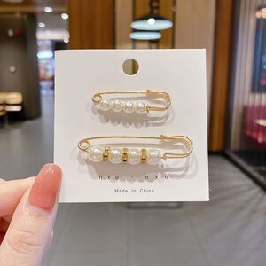 Pantalones de jeans de cintura, botones de cintura ajustados, botones ajustables fijos