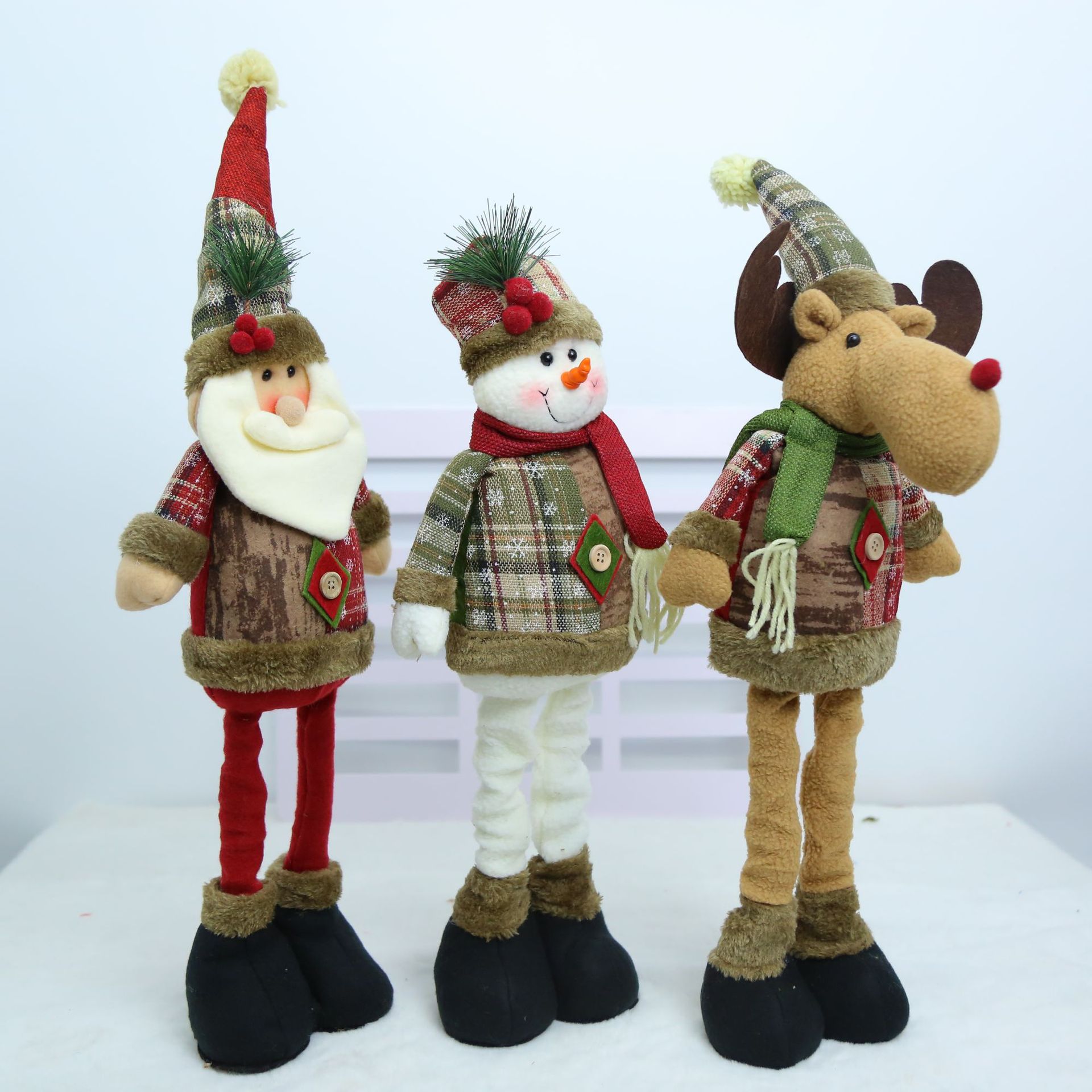 Navidad transfronteriza europea y americana rural retro tejido retráctil piernas viejos muñecas de nieve muñecas de alce adornos juguetes de peluche