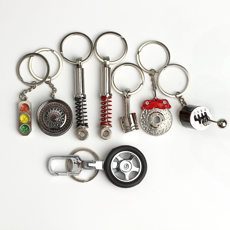 Cross-border car modification accessories small gift men's metal shock absorber tire pendant wholesale wheel hub keychain