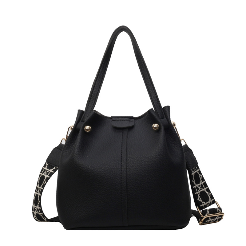 Mayorista retro bolso de cubo portátil para mujeres ventas calientes nuevo retro gran capacidad bolso de hombro simple mochila de viaje
