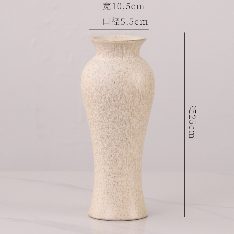 陶磁器の花瓶の水培花は寂しい風があります。