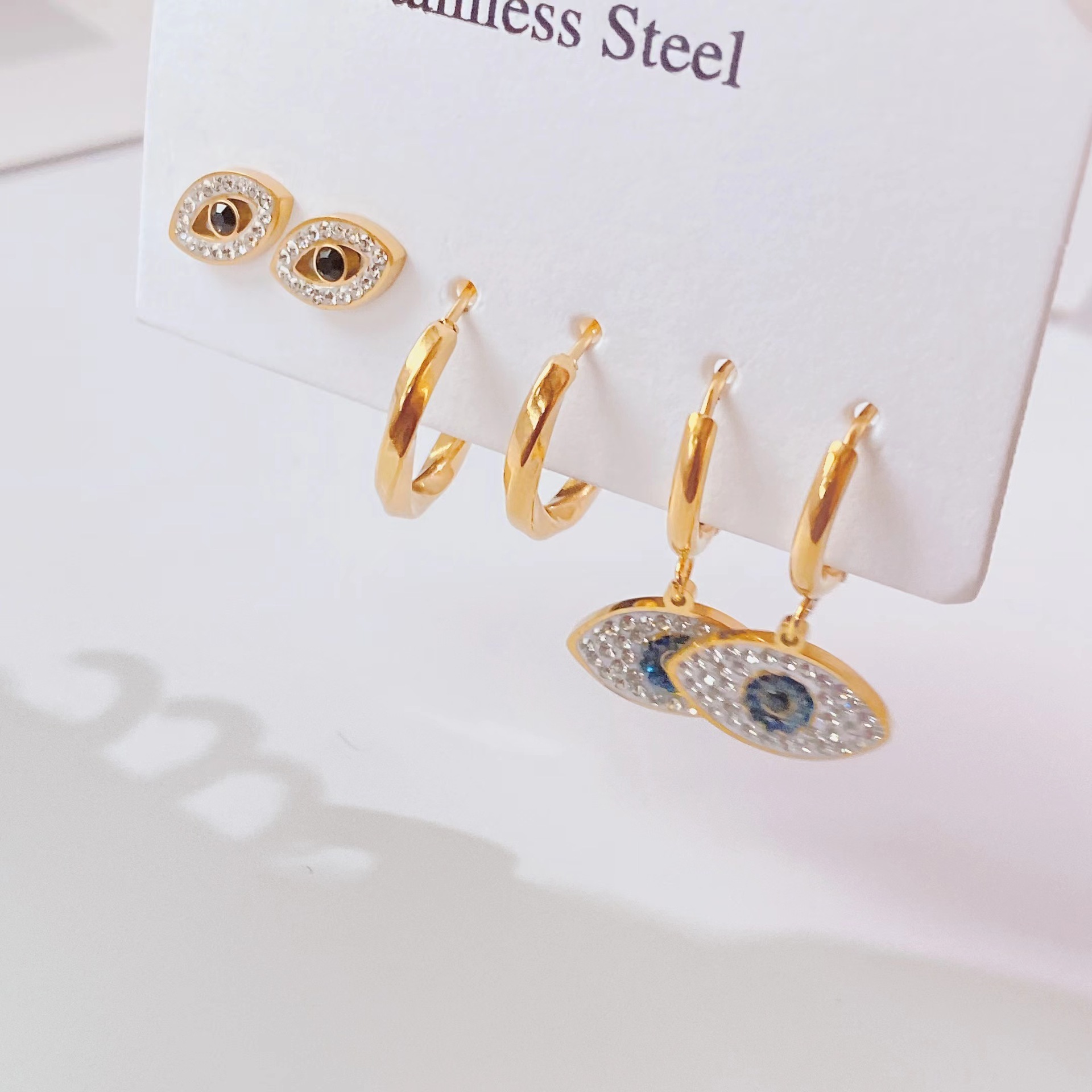fashion new titanium steel micro-diamond zircon eye shape earrings set