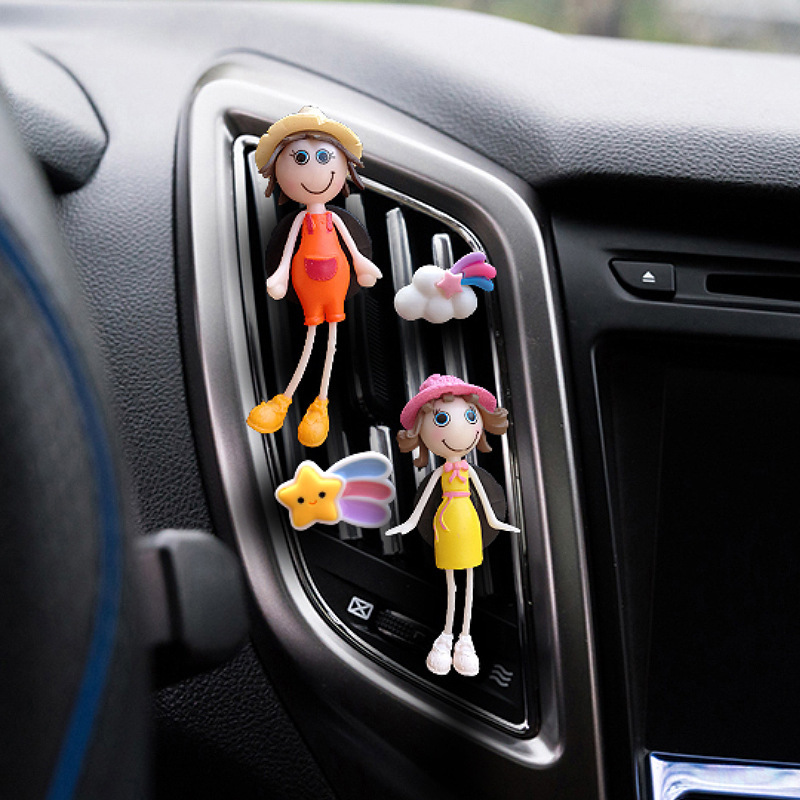 Cartoon transfronterizo coche perfume salida de aire clip coche aromaterapia boca de aire acondicionado fragancia ligera duradera muñeca colgante muñeca