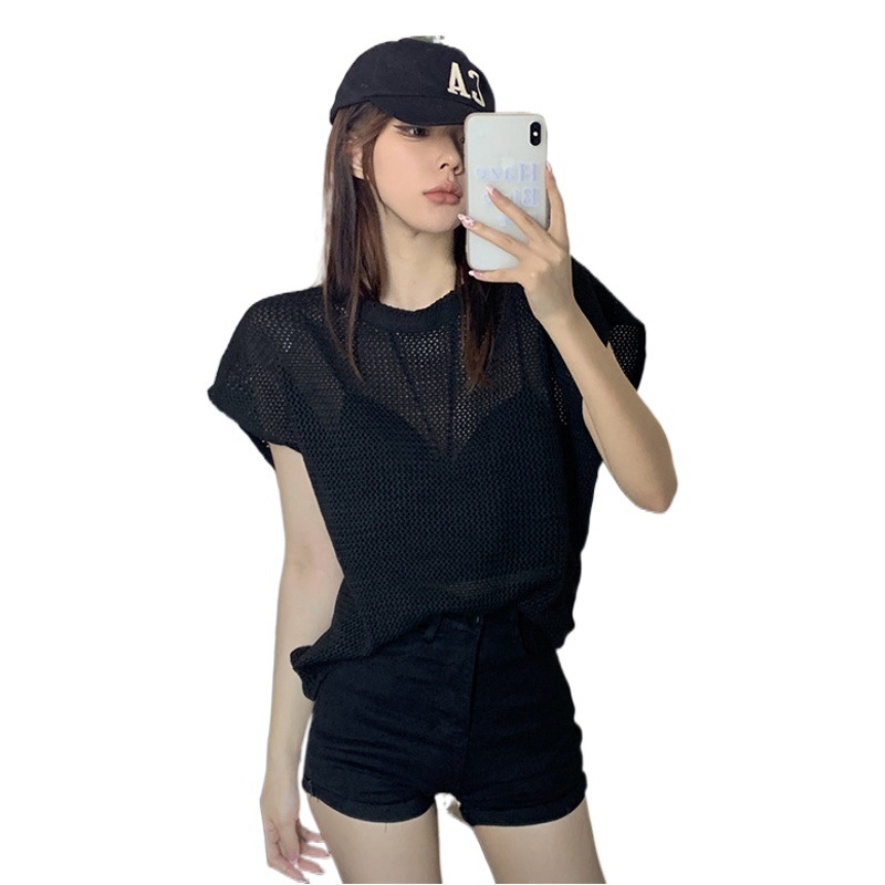 Camiseta de manga corta de estilo coreano para mujer verano delgada chica caliente diseño de blusa de protección solar hueca suelta adelgazante Top corto