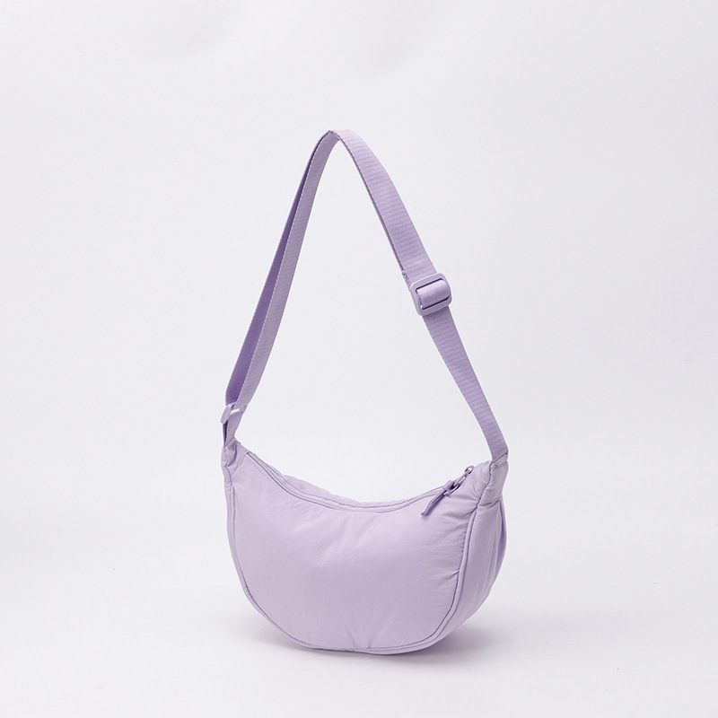 Bolso de tela pequeño bolso de moda ligero bolso de mochila de nylon transfronterizo mujer bolso de hombro casual versátil bolso de bolsas de bolsas de bollo de gran capacidad