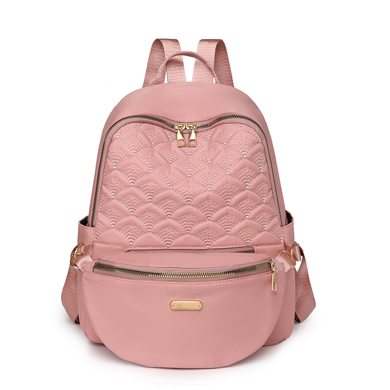 Comercio exterior al por mayor 2024 nueva versión coreana de la mochila de las señoras moda todo fósforo de gran capacidad mochila de viaje