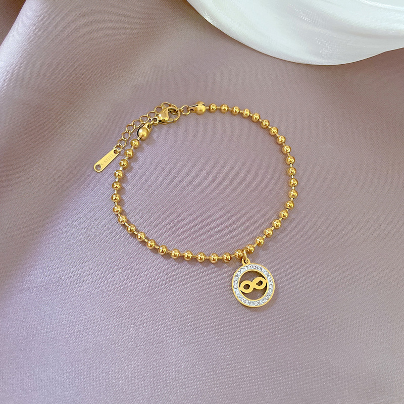 Bracciale donna con perline rotonde personalizzato in acciaio_voghion.com