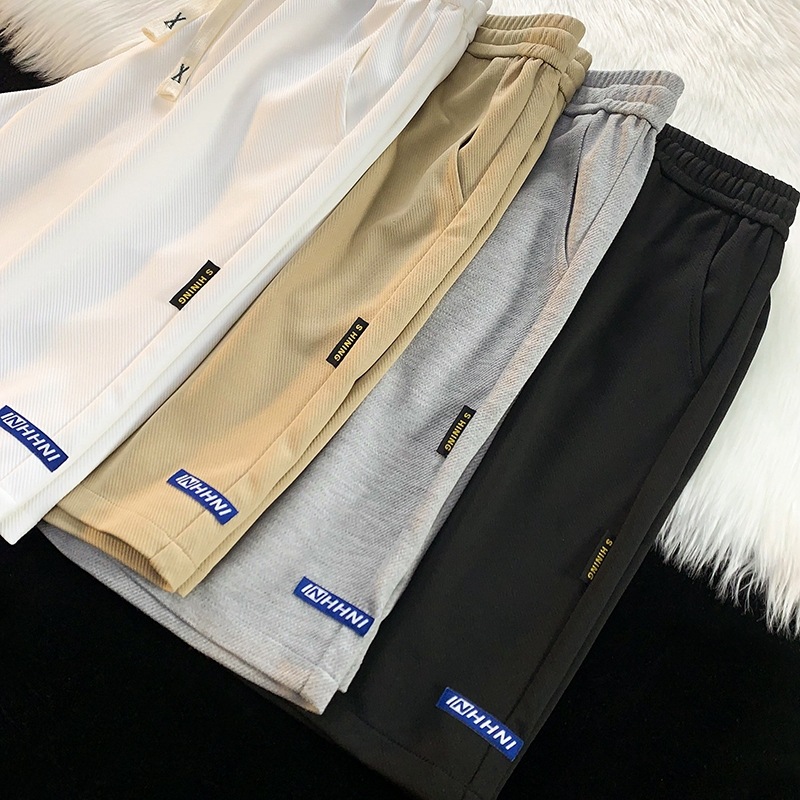 Pantalones casuales de estilo de Hong Kong, pantalones cortos para parejas masculinas, pantalones de tendencia sueltos, pantalones de tendencia de verano, pantalones de moda simples, deportivo