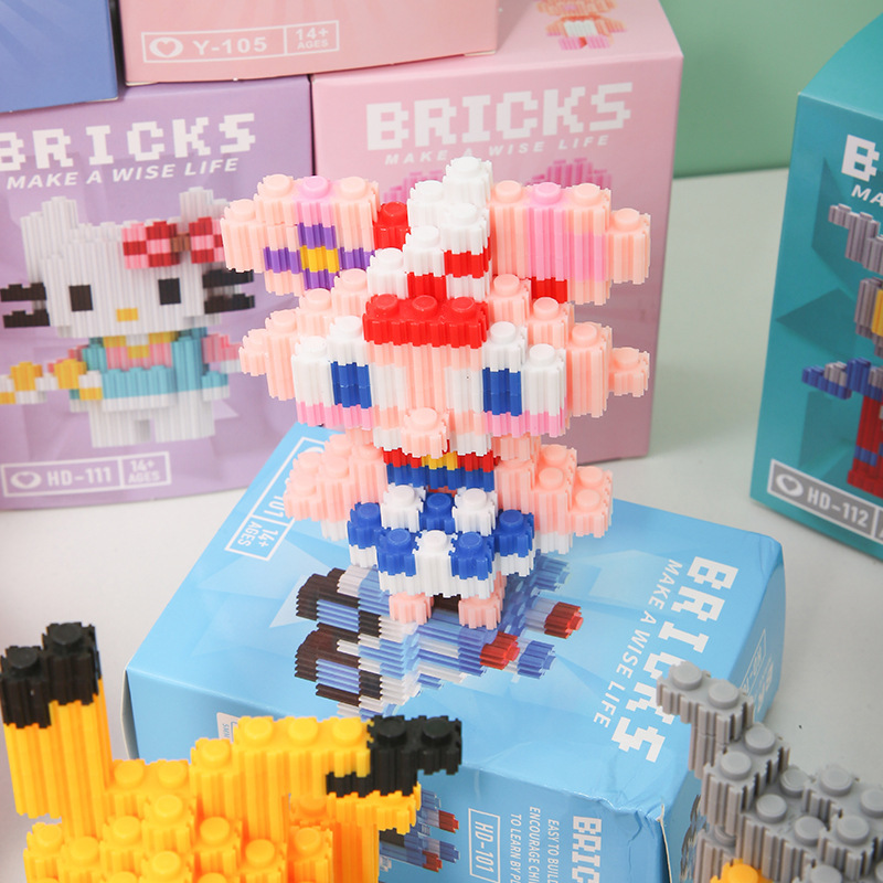 Pequeños bloques de construcción de partículas para niños compatibles con bloques de construcción Lego venta caliente muñeca de dibujos animados rompecabezas para niños caja ciega al por mayor