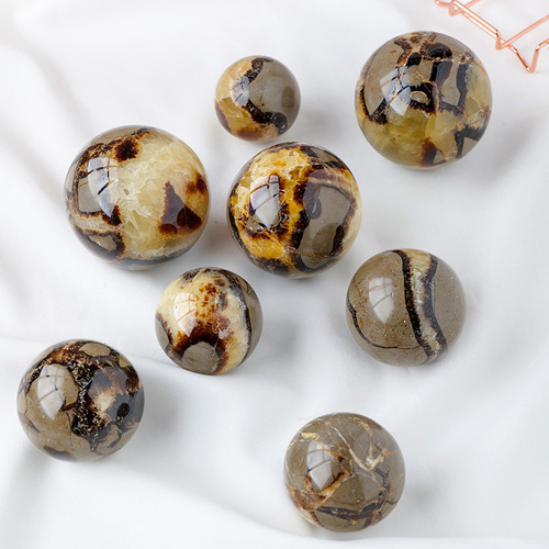 Natural turtle stone spherical ornaments mineral crystal jewelry rough stone polishing crafts manufacturers wholesale