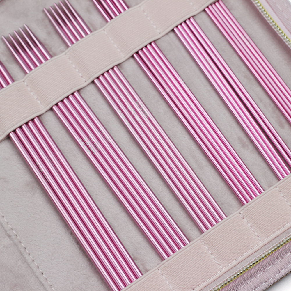 Agujas de suéter de doble punta transfronterizas de alúmina rosa aguja corta un conjunto de 11 aguja 15 cm de largo 75 conjuntos