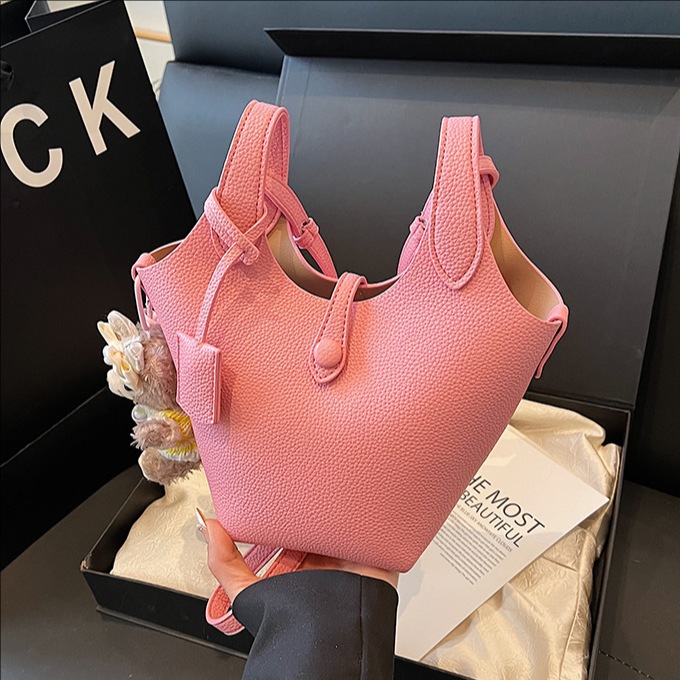 Bolso de cubo de canasta de verduras portátil de gran capacidad de alta calidad para mujer 2025 nuevo bolso de mensajero de hombro de estilo occidental de todo fósforo de moda