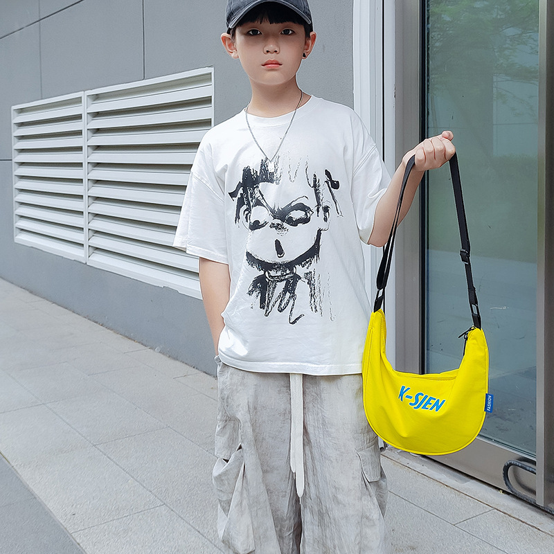 Moda coreana de moda para niños y niñas bolsas de饺os letras de aire extranjero de gran capacidad bolsas de mochila para niños nuevas bolsas para niños