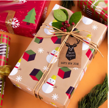 Papel de regalo navideño superventas transfronterizo, papel de regalo para San Valentín y cumpleaños, papel de fondo para pared, papel para cubiertas de libros al por mayor.