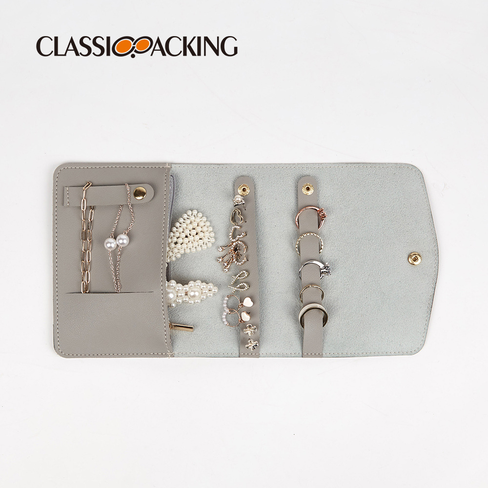 Bolsa de joyería al por mayor bolsa de almacenamiento de joyería tipo sobre plano bolsa de cosméticos de mano portátil bolsa de almacenamiento de joyería