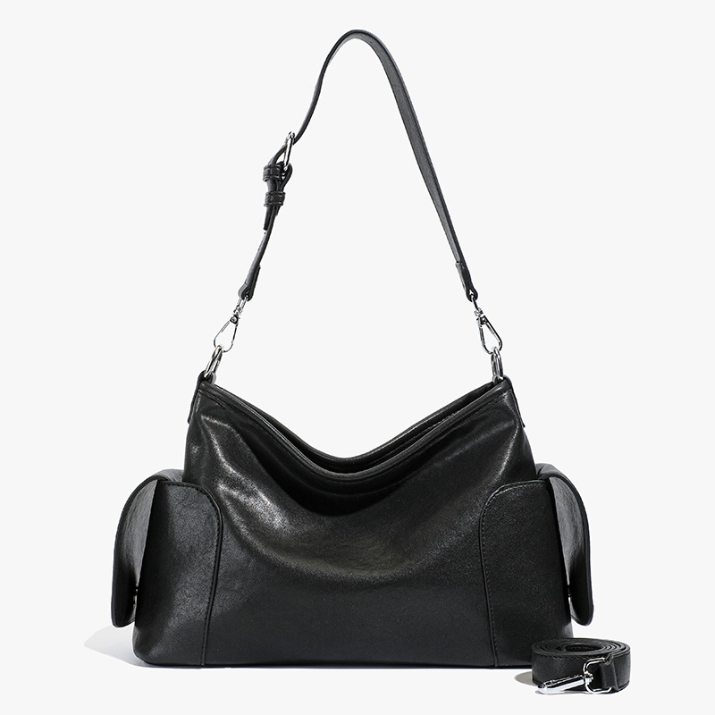 Bolsa de hombro y brazo de nicho francés para mujeres otoño / invierno 2025 nuevo retro mochila de cuero suave bolsa de viaje