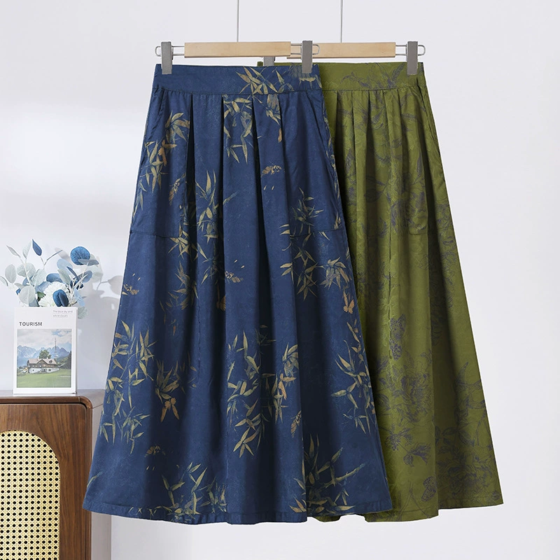 Двусторонняя юбка для мам, летняя высококачественная эластичная талия с принтом для людей среднего и пожилого возраста, стройнящая и элегантная юбка средней длины с широким подолом.