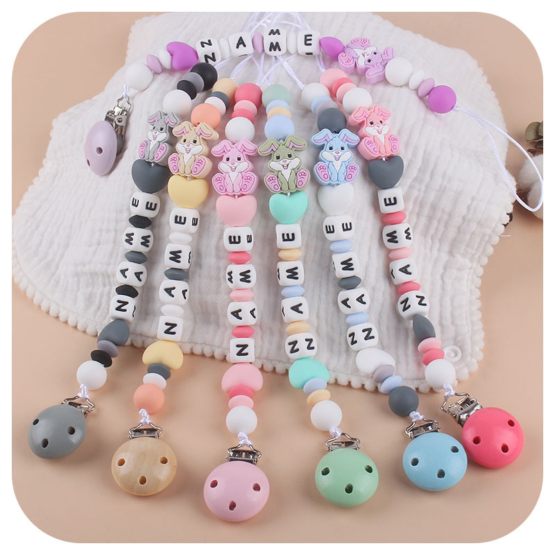 Nuevo bebé suministros chupete cadena DIY bebé nombre silicona teether conejo teether traje