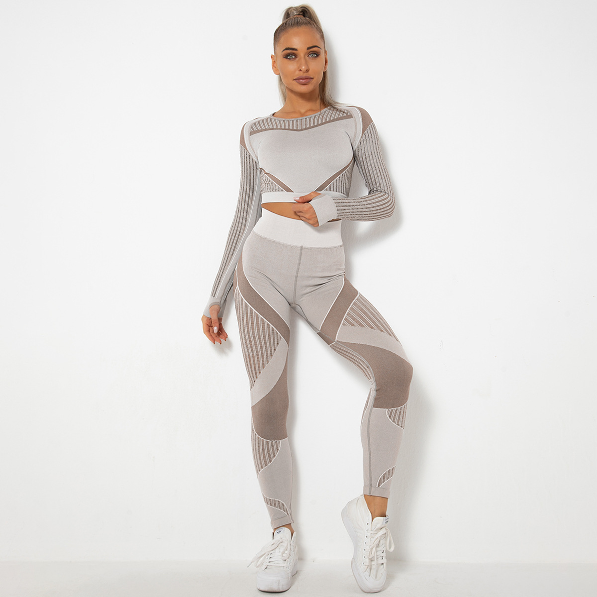 ¡En stock! Europeo y americano sin costuras hueco-fuera de absorción de humedad de yoga traje de manga larga ropa de yoga deportes fitness correr pantalones de yoga para mujeres