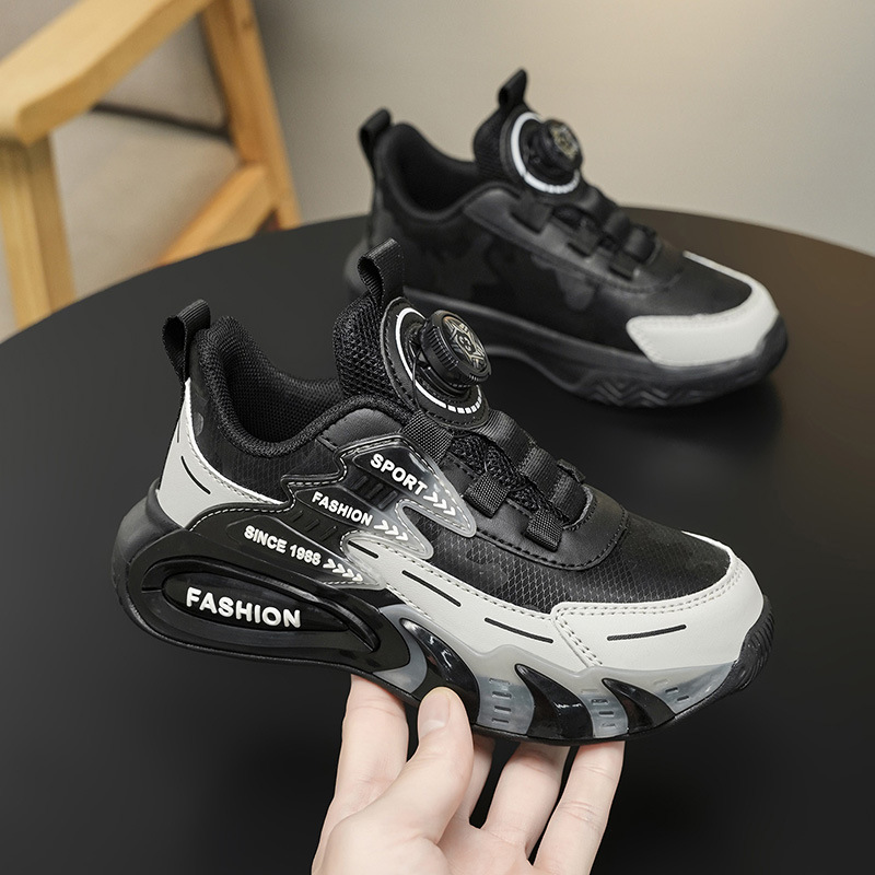 Zapatos de botón giratorio para niños primavera y otoño zapatos de malla transpirables para niños zapatos de corrida de moda universal al por mayor