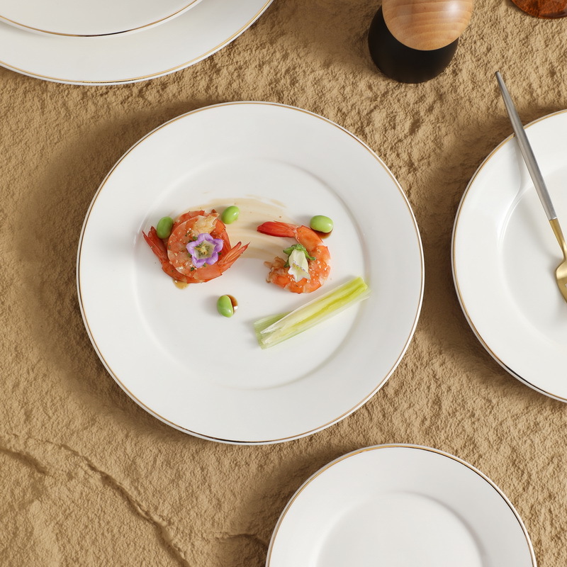 Restaurante de platos de comida occidental redonda de cerámica blanca pura Phnom Penh plato de filete de alta gama plato plano escupir hueso plato plato plato plato plato plato