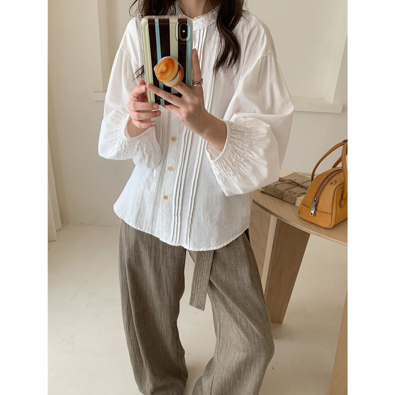 Korean-style stand-up collar pleated shirt for women, autumn collection, with ruffled trim, lantern sleeves, elastic cuffs, and a loose fit. ZC