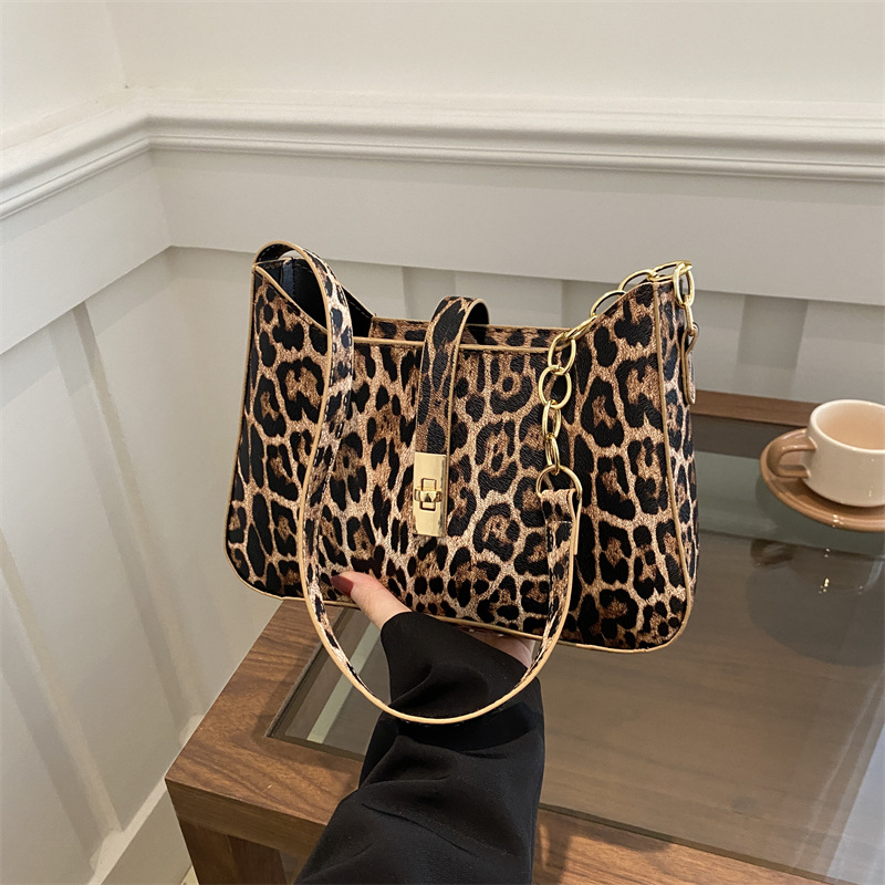 Bolso de leopardo de alto valor de cara nicho de mujeres 2025 nueva moda personalidad bolso de brazo de hombro caliente bolso pequeño