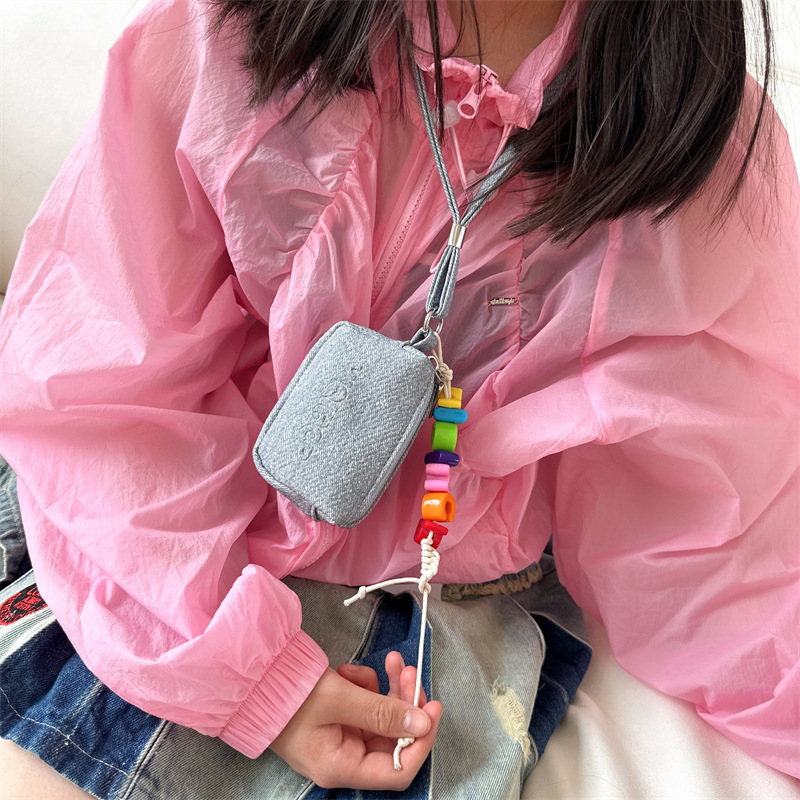 Bolsos para niños coreanos, tendencia de personalidad, mini bolso con cuello halter para niños y niñas 2025 nuevo bolso para auriculares, monedero para bebés
