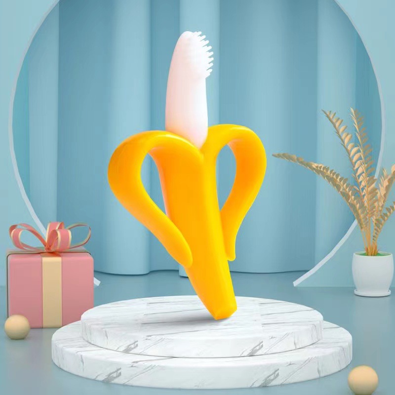 Fabricantes de productos de grado alimenticio silicona banana dentín para bebés palillos de dientes recién nacidos mordidos juguetes de dentín para bebés