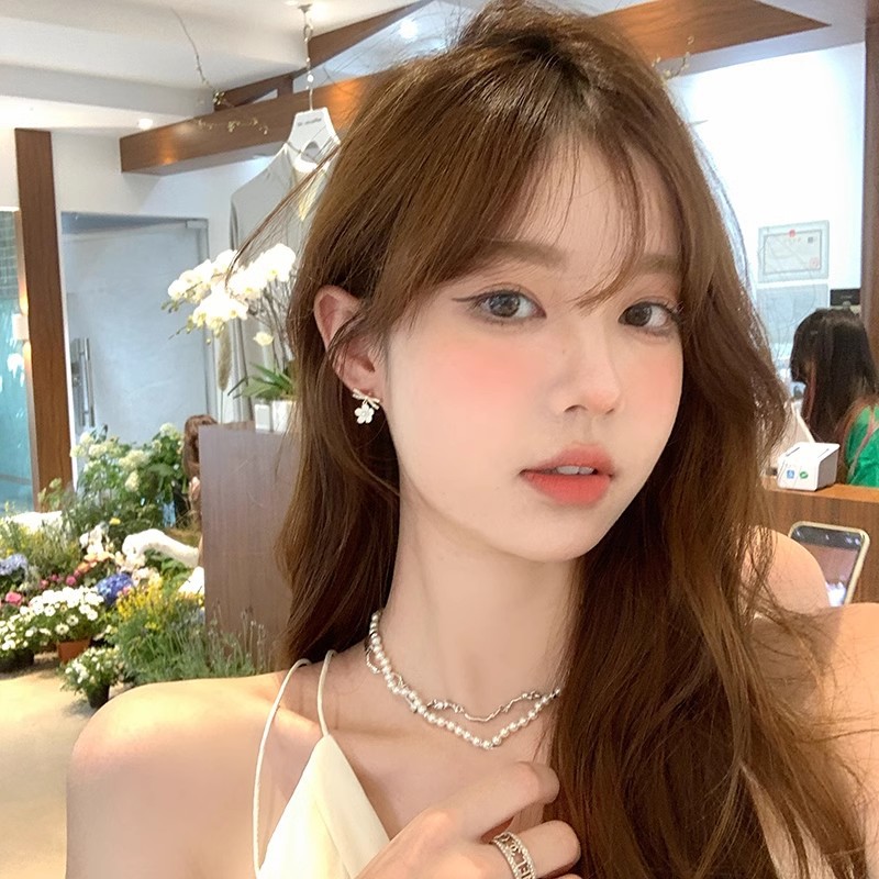 Elegant fashionable cute universal earrings with bow from pearl