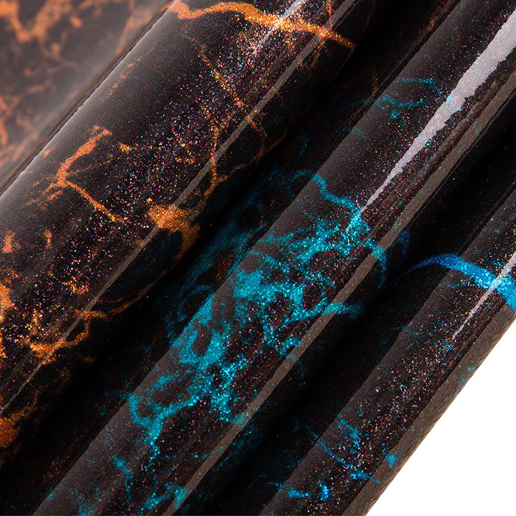 厂家批发PVC上金葱粉格利特皮革水晶镜面防水不掉粉箱包手袋面料