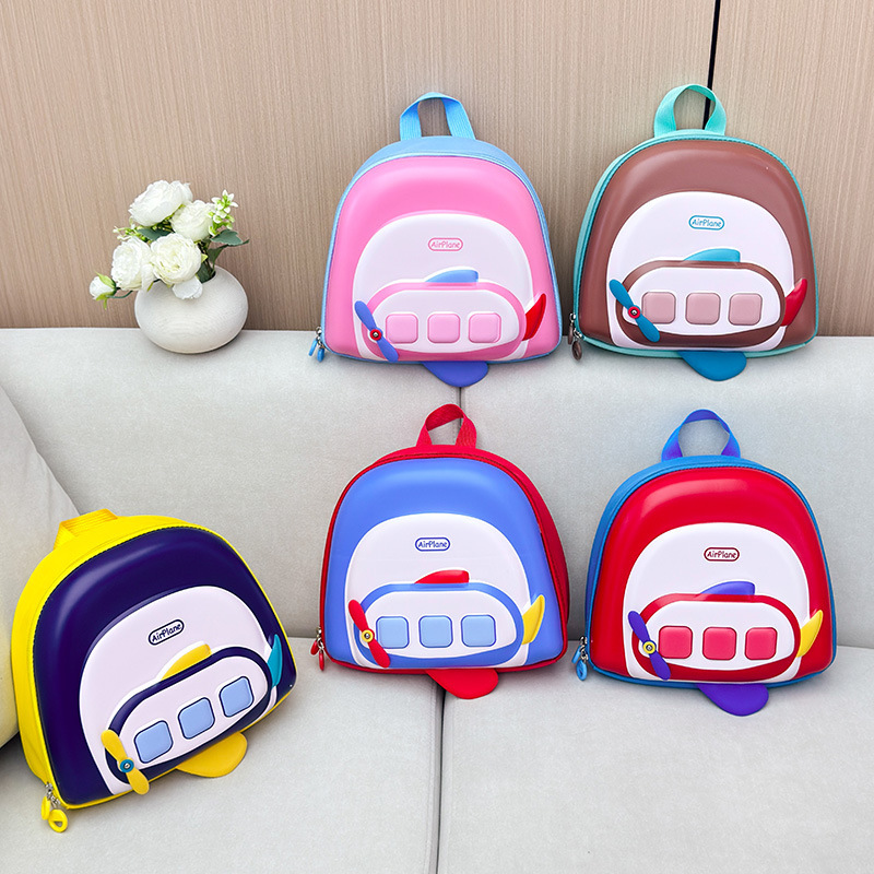 Mochila de cáscara dura para niños aviones de dibujos animados jardín de infantes mochila de cáscara de huevo para niños y niñas mochila tridimensional comercio exterior