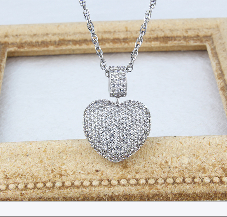 New Heart-shaped Diamond Necklace Female Stock Direct Supply Simple Titanium Steel Rotatable Hollow Love Pendant display picture 2