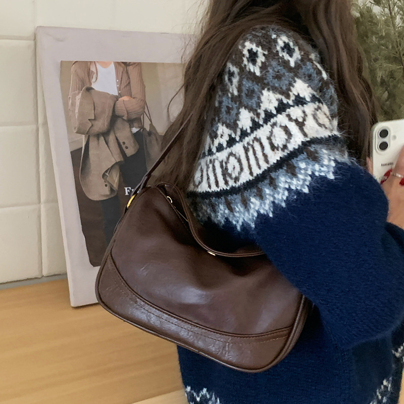 가볍고 패셔너블하며 다재다능한 복고풍 스타일의 가방 2025 새로운 고급 틈새 디자인 싱글 숄더 크로스바디 만두 가방