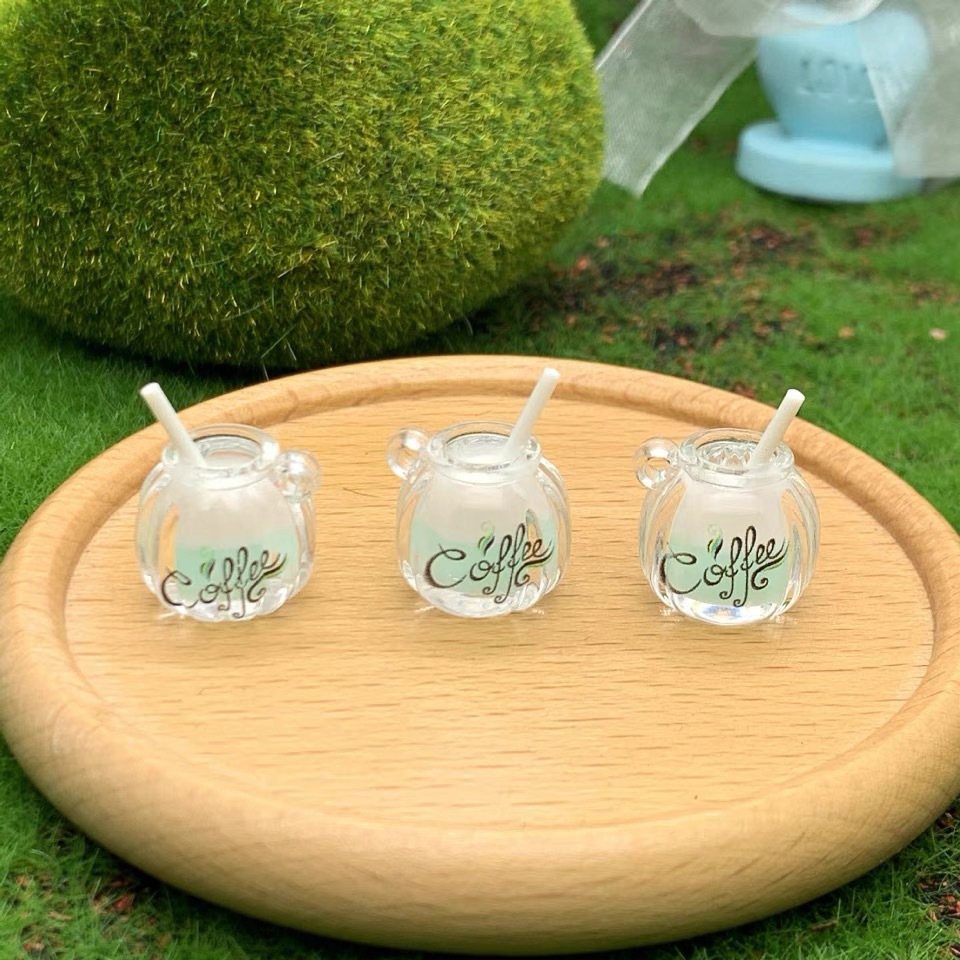 Suministro directo de fábrica de dos colores taza de café luminosa DIY accesorios para el cabello llavero mochila colgante material al por mayor diadema hecha a mano