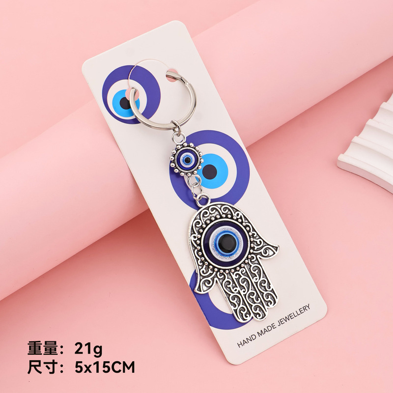 Cross-Border Hot-Selling Devil's Eye Keychain, Hollow Blue Eye with Diamond-Encrusted Hamsa Hand Pendant, Bag Accessories for Export