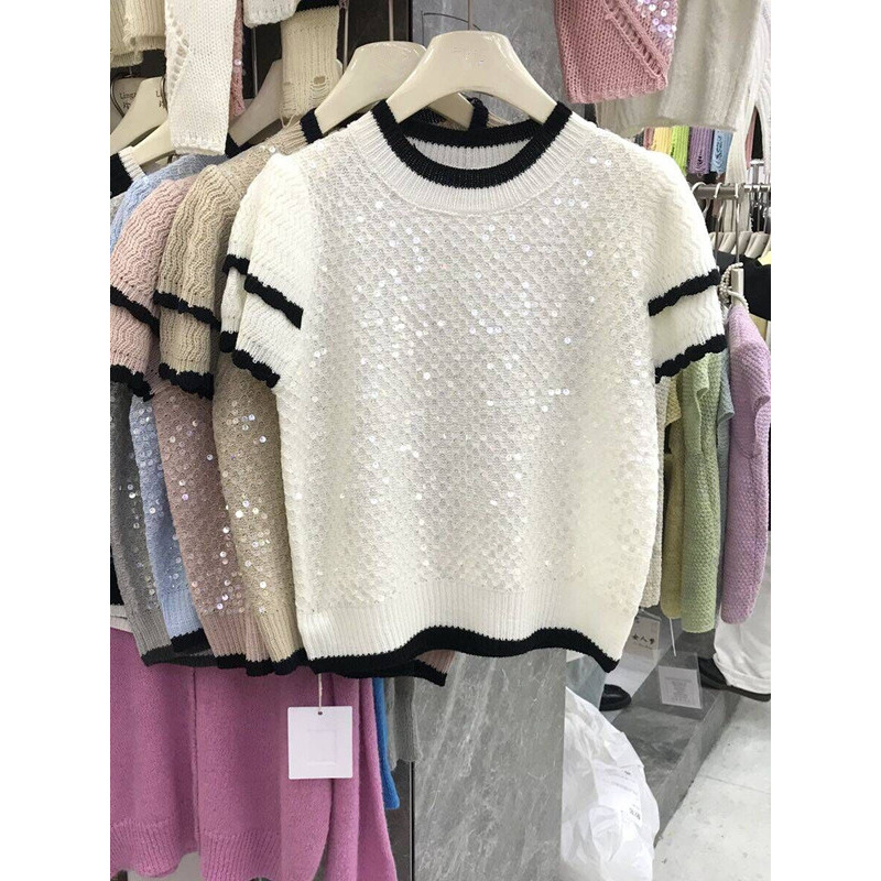 Summer apricot knitted sweater with a round collar