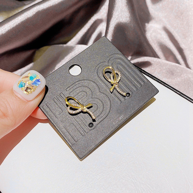 Korean S925 Silver Needle Simple Fashion Zircon Micro-inlaid Bow Earrings display picture 2