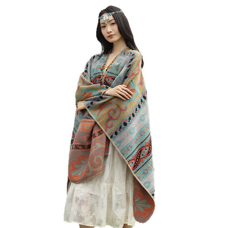 El estilo nacional totem explotó la capa para viajes de estilo masculino y femenino para tomar fotos, debe mantenerse caliente a prueba de viento, Qinghai, turismo tibetano