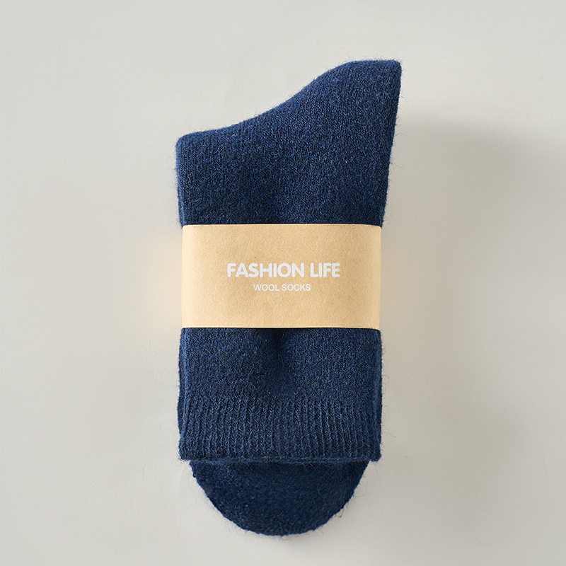 Calcetines de lana otoño e invierno más calcetines de mujer engrosados de terciopelo para hombres Calcetines cálidos de felpa de color sólido Calcetines de tubo medio para mujer de nieve