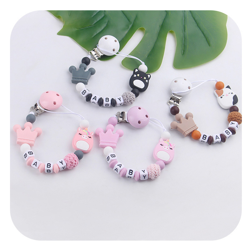 Productos para bebés amor clip de tetina dibujos animados creativos juguetes unicornio silicona molar tetina cadena anti-caída cadena