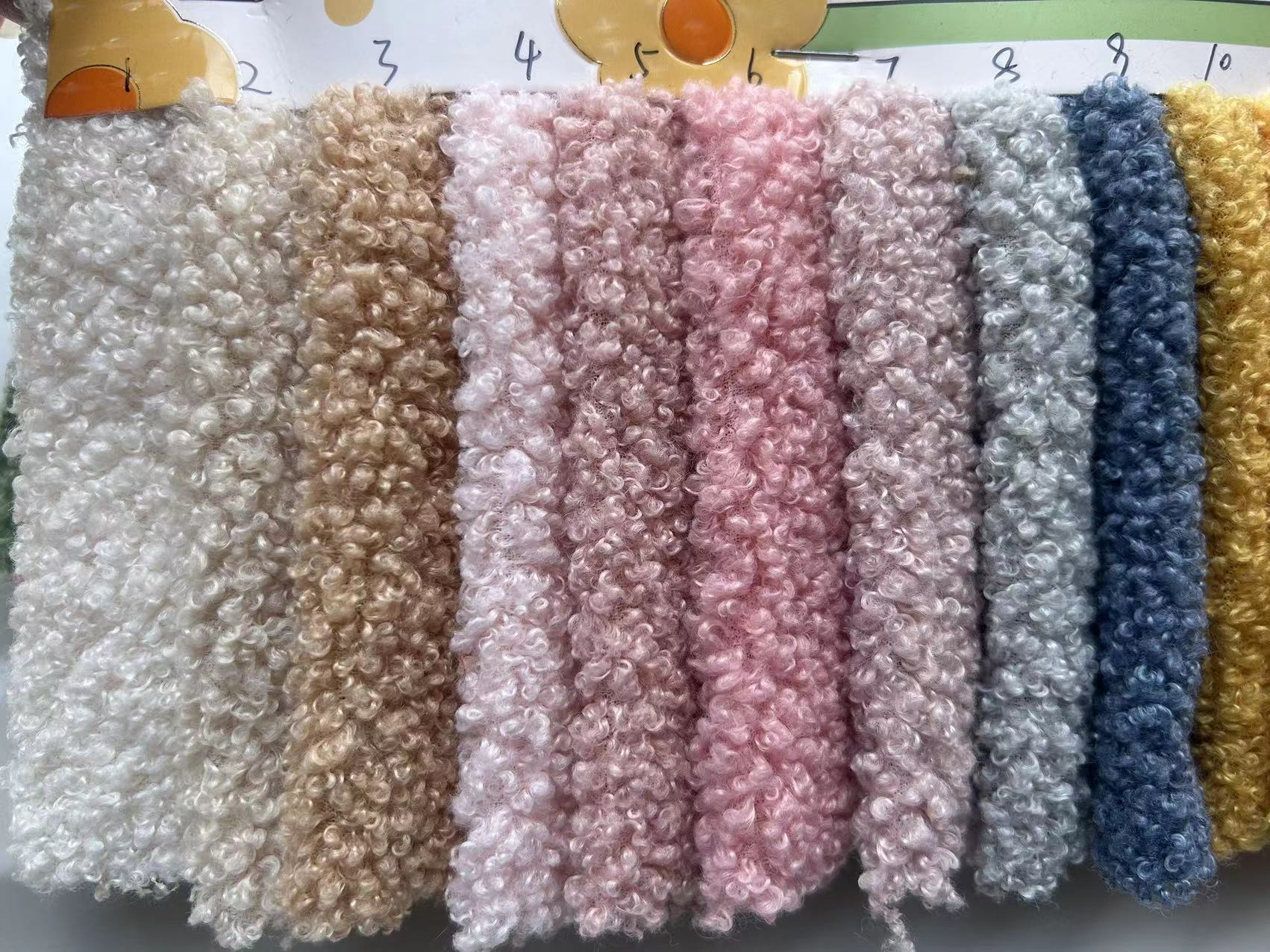 Super suave tela de terciopelo de peluche llanura pequeña partícula poliéster felpa abrigo ropa de tela de juguete para niños en stock