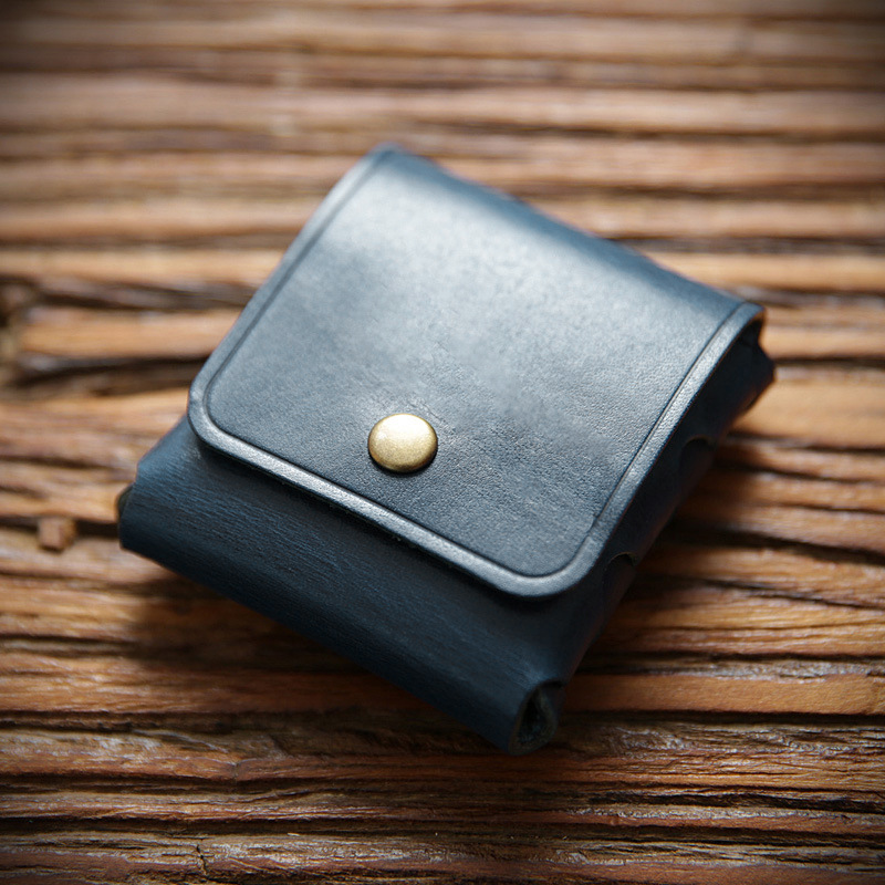男女のミニ小銭入れは、トップの牛革をなめして、硬貨を掛けて、本革のイヤホンの保護カバーをしています。
